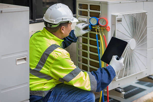 Professional Air Conditioning Repair technician working in Milford, MI